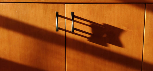 [ORGMENT] The "Tension Rod Vertical Divider": How to stop baking sheets and cutting boards from avalanching in kitchen cabinets