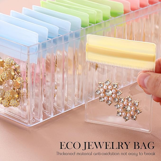 Kenning 63 Pcs Acrylic Jewelry Case Organizer, Clear Jewelry Organizers Holder with Portable Anti Tarnish Storage Bags for Rings, Earrings, Necklaces, Ideal Gifts for Women (Four Color Mixture)